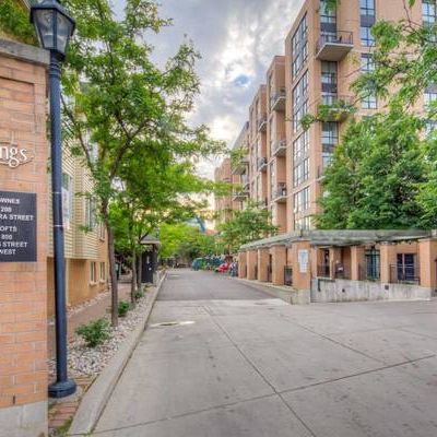 Trendy 1-BR stacked condo townhouse for rent at the King West Village - Photo 1