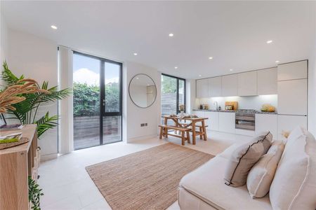 An interior designed, two-bedroom apartment in this modern & popular development. - Photo 2