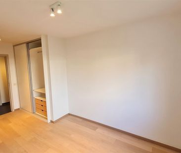 Ruim gelijkvloers appartement met eigen tuin - Foto 4