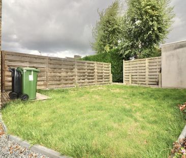 Mooie half-open bebouwing met 3 slpks, garage en tuin voor 975 EUR/mnd - Photo 2