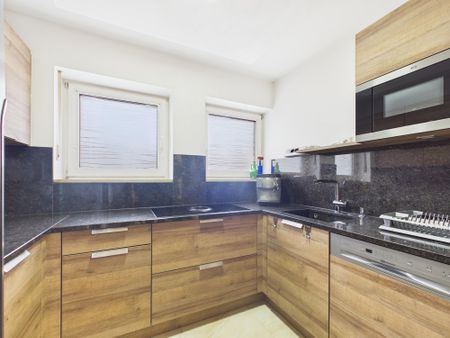 Möblierte 3-Zimmer-Gartenwohnung mit Kamin und Einbauküche - Foto 5