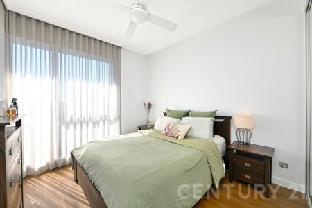 Elevated Luxury with Soaring Ceilings & Water Views - Photo 4