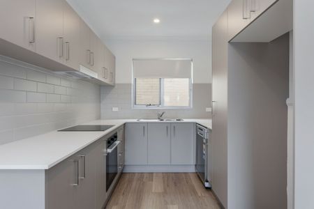 Fully Renovated Coastal Comfort - Stylish Beachside 2 Bedroom Unit with Ocean Views - Photo 4