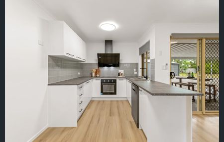 Private and fully renovated five-bedroom lifestyle home offering modern comfort, expansive outdoor space, and versatile storage on a generous 4,379sqm - Photo 3