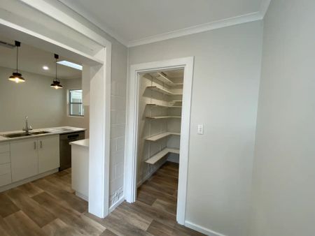 “Renovated Family Home Awaiting New Tenants” - Photo 5