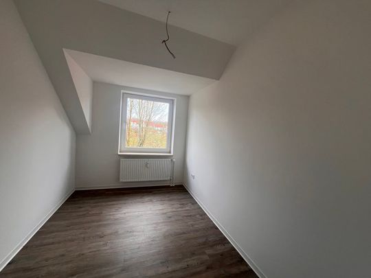 Helle 3-Zimmer-Dachgeschoss-Wohnung mit Weitblick! - Photo 1