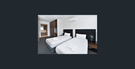 Luxury CBD Apartment — Walk to Uni, Victoria Market & Free Transport! Just Bring Your Suitcase for Exclusive Furnished Living - Photo 5