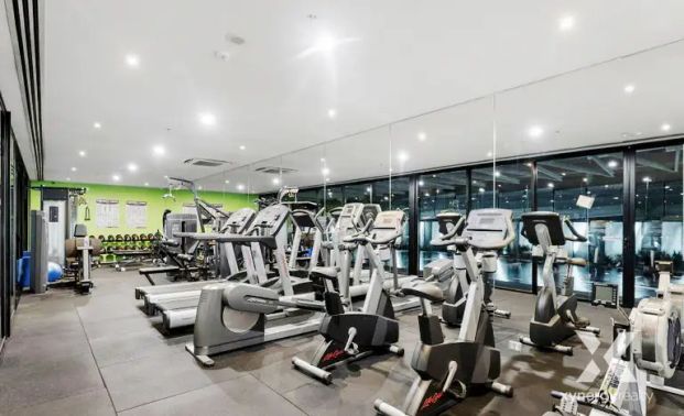 “Fully Furnished 1-Bed, 1-Bath Apartment in Docklands - Your Turnkey Urban Oasis!” - Photo 1