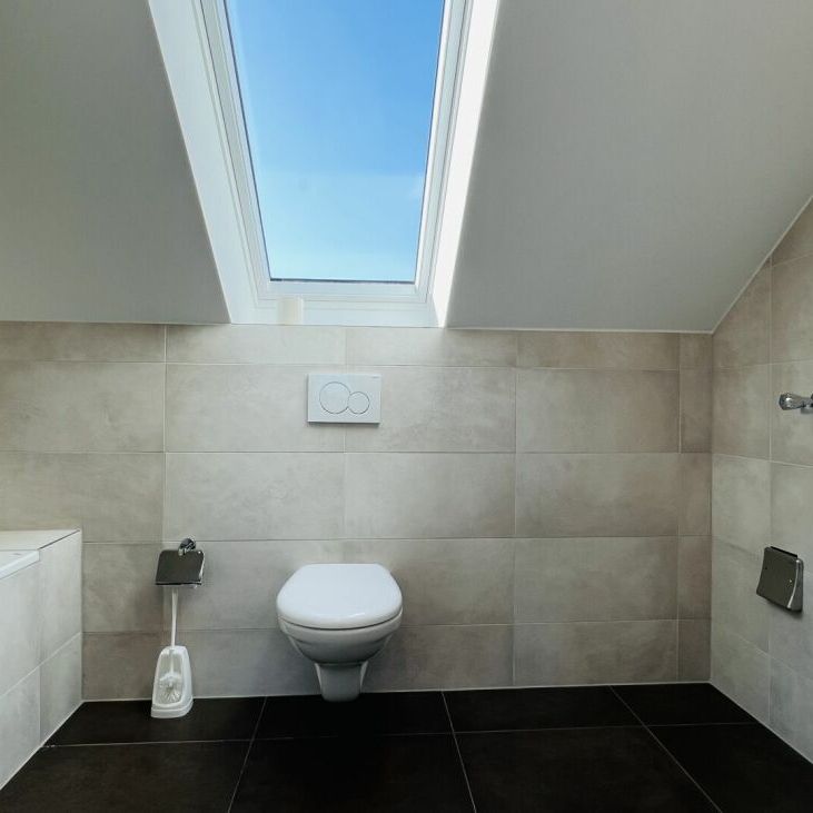 Totalsanierte 2.5-Zimmer-Wohnung mit Balkon und eigenem Waschturm - Foto 1