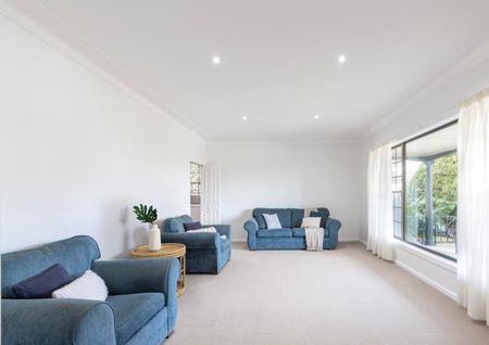 Three-Bedroom Home in the Heart of Belmont North - Photo 2