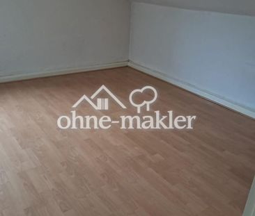 Großzügig geschnittene DG-Wohnung in verkehrsgünstiger Lage von Rat... - Foto 1