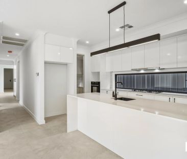 Brand New Four Bedroom Home Minutes from CBD - Photo 4