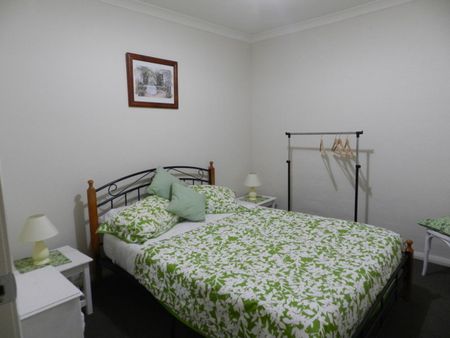 NEAT QUIET AND LOW MAINTENANCE - Photo 2