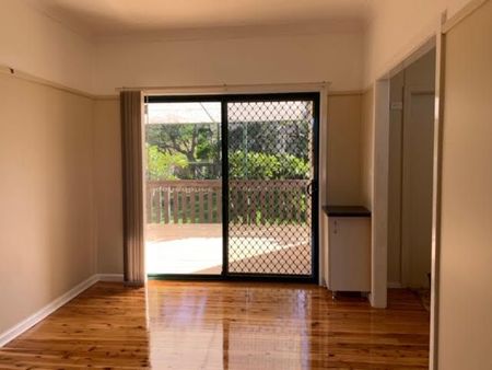 Charming Family Home with Spacious Backyard and Modern Comforts - Photo 2