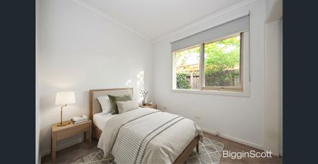 Light-Filled North-Facing Living in a Convenient Location - Photo 3