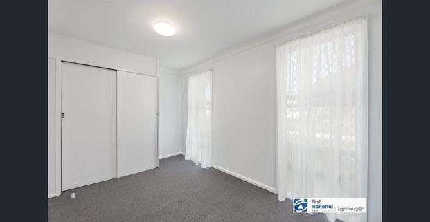 Freshly renovated 2-bedroom unit - Photo 1