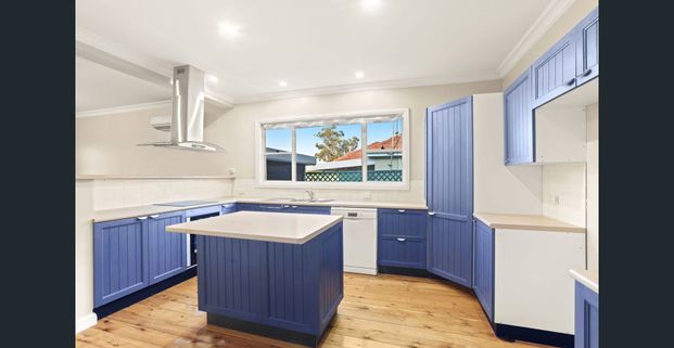 WELL KEPT FAMILY HOME POSITIONED WALKING DISTANCE TO REVESBY TRAIN STATION - Photo 1