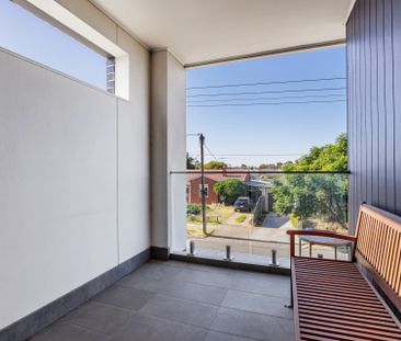 Stylish, Low-Maintenance Townhouse in Prime Location - Photo 1