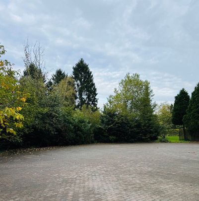 Gelijkvloers 3 slaapkamer appartement met grote garage. - Foto 1