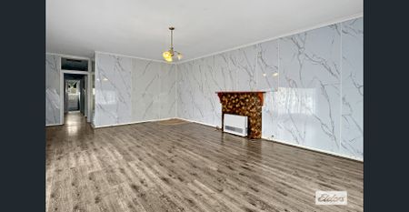 THREE-BEDROOM HOME WITH GARAGE - Photo 2