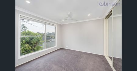 Renovated Family Home with Entertaining Deck and Double Shed - Photo 4