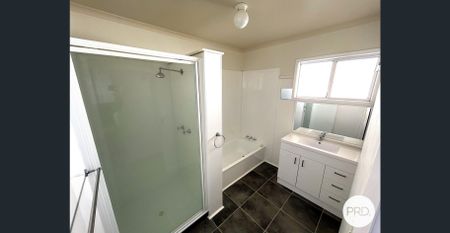 CLOSE TO THE BEACH WITH LARGE YARD & PLENTY OF STORAGE - Photo 3