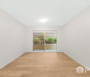 Beautifully Renovated 2 bedrooms unit in an Ultra-convenient and qu... - Photo 1