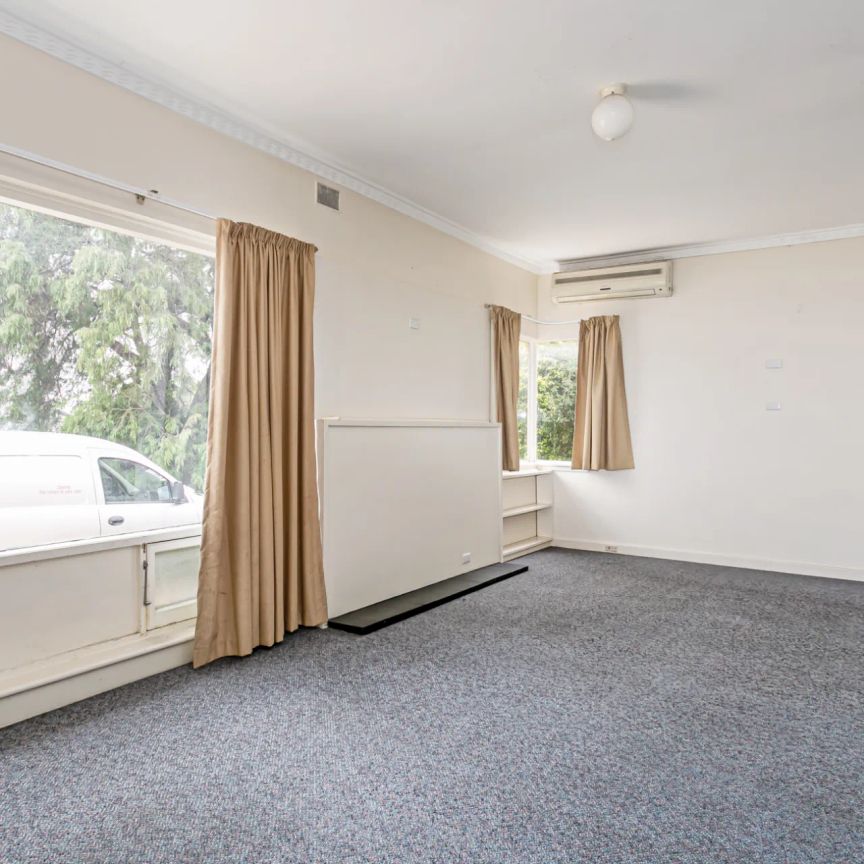 Four Bedroom Home in Popular Location - Photo 1