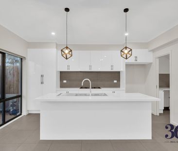 Stylish 3-Bedroom Townhouse with Modern Comforts & Thoughtful Design - Photo 4