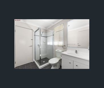 Modern & Spacious 4-Bedroom Unit in a Prime Location - Photo 6