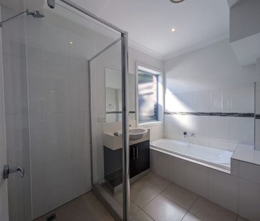 MODERN LIGHT FILLED TOWNHOUSE WITH HEATING / COOLING & OFF-STREET P... - Photo 6