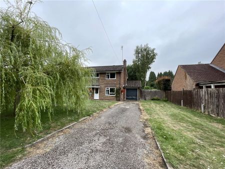 A well-presented 3-bedroom semi-detached house based on the outskirts of Whitchurch with driveway parking, garage and beautiful garden which overlooks a private nature reserve and watercress beds. - Photo 4