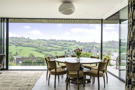 An exceptional contemporary home with quality interiors and landscaped gardens in an elevated position with village and open country views. - Photo 5