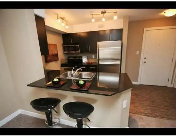 1 Bedroom Condo in Rutherford (with UNDERGROUND heated parking) — 1 Bedroom Condo Unit - Photo 1