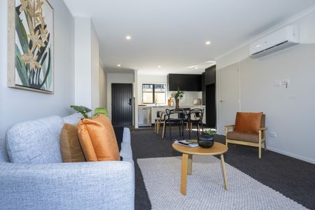 This contemporary two-bedroom, two-bathroom townhouse on Charlemont Street offers open-plan living with a modern kitchen, heat pump for year-round comfort. - Photo 3
