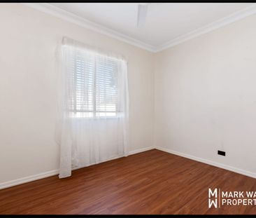 WELL PRESENTED THREE-BEDROOM HOME WITH AMPLE STORAGE SPACE AND YARD - Photo 2