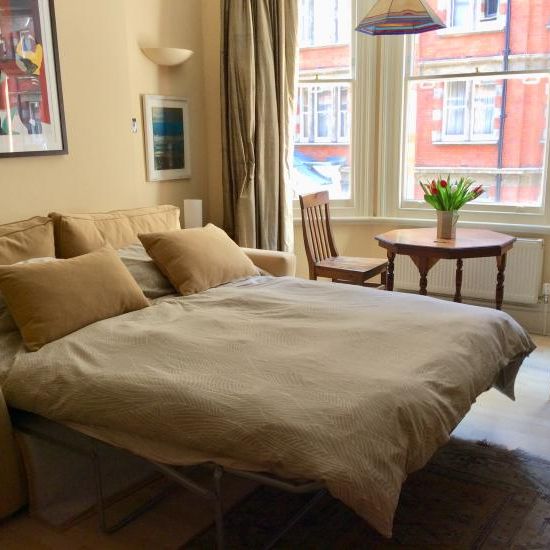 Double sunny ensuite room in quiet street, 3 minutes from Baker St station, NW1. - Photo 1