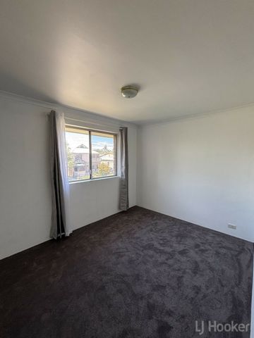 Two Bedroom Top Floor Unit - Photo 4