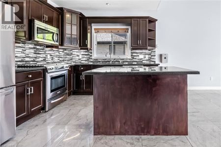 4 CLAIRFIELDS Drive W, Guelph, Ontario, N1G5H5 - Photo 2