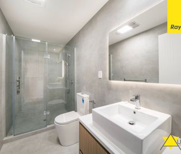 Stylish Three-Level Living in a Prime, Convenient Location - Photo 1