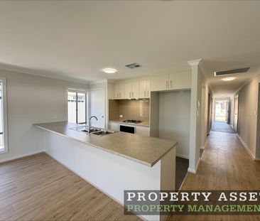 Beautiful Brand-New Family Home with Solar & Second Living Area - Photo 4