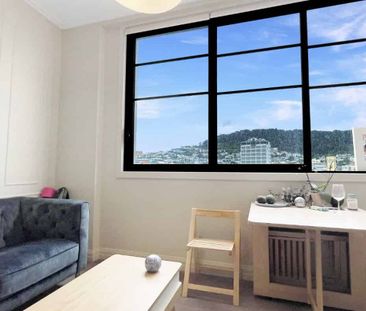 Welcome to Apartment 402A in Chevron Suites - Photo 1