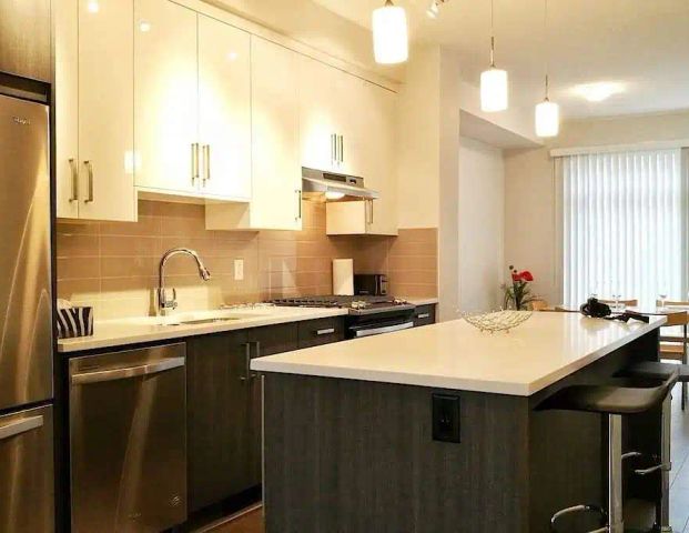 3 bedroom townhouse — 3 Bedrooms+ Den Townhouse - Photo 1