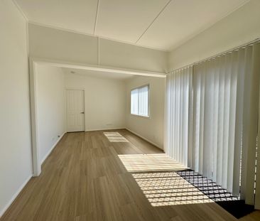 MODERN FAMILY HOME WITH MULTIPLE LIVING SPACES! - Photo 4