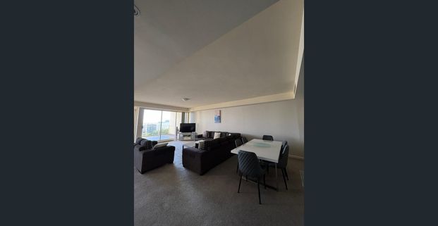 Fully Furnished Coastal Living in Prime Location - Photo 1