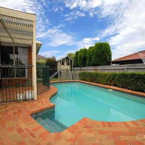 Spacious Family Home with Pool & Multiple Living Areas - Photo 2