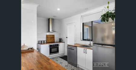 Renovated Family Home with Modern Finishes & Secure Yard - Photo 4