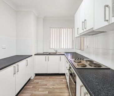 RENOVATED 2 BEDROOM UNIT WITH SPLIT AIR CONDITIONER - Photo 2