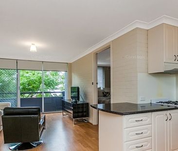 MODERN 1 BEDROOM UNIT IN A GREAT LOCATION BOASTING VALUE - Photo 1