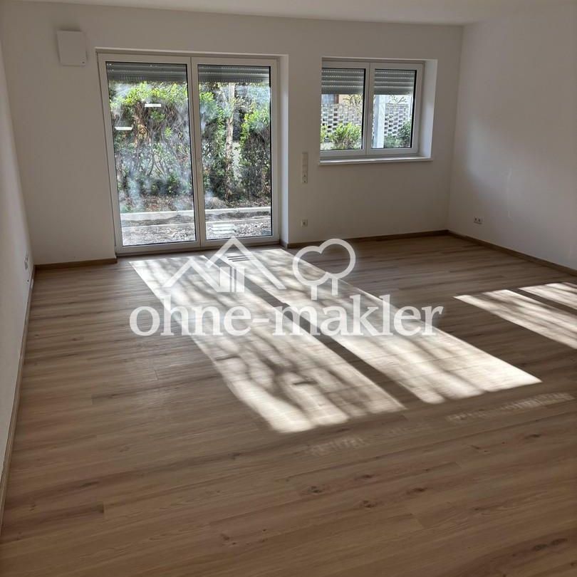 Erstbezug: 3-Zimmer Dachgeschoss Wohnung in energieeffizientem KFW55 Haus - Photo 1